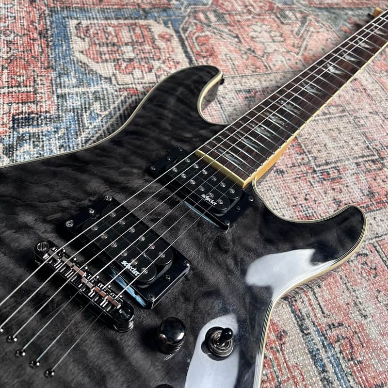 Schecter Omen Extreme-6 Electric Guitar w/ Case - See-Thru Black
