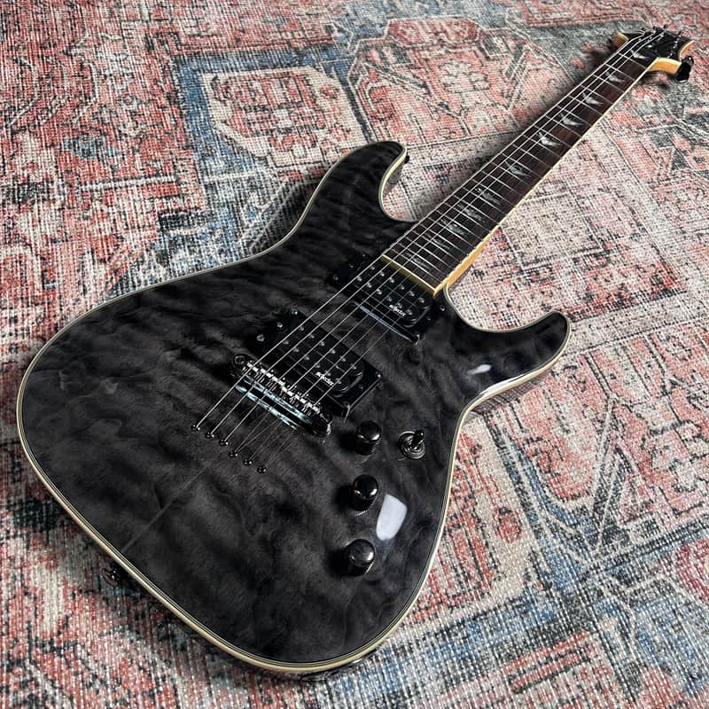 Schecter Omen Extreme-6 Electric Guitar w/ Case - See-Thru Black