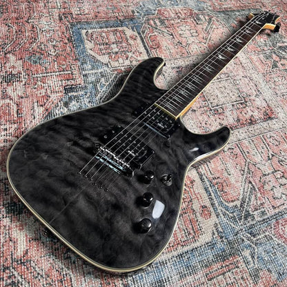 Schecter Omen Extreme-6 Electric Guitar w/ Case - See-Thru Black