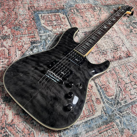 Schecter Omen Extreme-6 Electric Guitar w/ Case - See-Thru Black