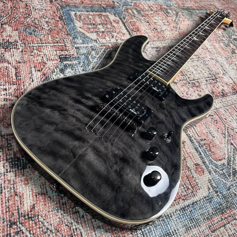 Schecter Omen Extreme-6 Electric Guitar w/ Case - See-Thru Black